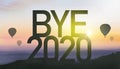 Goodbye 2020 concept. Silhouette number on the hill