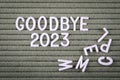 Goodbye 2023 Concept. White letters of the alphabet on a green background