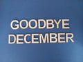 Goodbye December sign on a blue background
