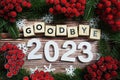 Goodbye 2023 holidays celebration with christmas decorations background