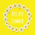 Goodbye Summer text and flower composition. Frame floral round wreath of flowers chamomile on yellow background. Greeting card Royalty Free Stock Photo