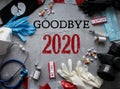 Goodbye 2020! Symbols of the outgoing year: respirators and masks, pills and vaccine, coronavirus tests and tape fencing. The