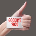 Goodbye year 2021 with hand