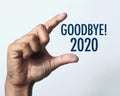 Goodbye year 2021 with hand