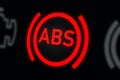 Anti-lock Braking System (ABS) Warning Light on Car Dashboard. Digital background. 3D rendering