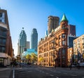 Gooderham or Flatiron Building in downtown Toronto with CN Tower - Toronto, Ontario, Canada