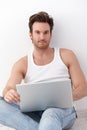 Goodlooking man with laptop Royalty Free Stock Photo