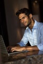 Goodlooking young man with laptop computer Royalty Free Stock Photo