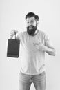 Goods for men. Man with package. cyber monday concept. little pleasantness. bearded man go shopping. store for men Royalty Free Stock Photo