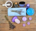 Goods for spa: soap, sea salt, towel, oil of lavender on wooden Royalty Free Stock Photo