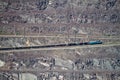 Goods train on the iron ore opencast mine Royalty Free Stock Photo