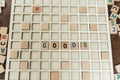 goods word made of wooden letter cubes on vocabulary game grid - stock market metaphore
