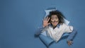 Goofy crazy female scientist grinning and smiling on camera