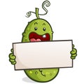 Adorable baby pickle cartoon mascot holding a blank poster board for an advertisement