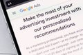 Google Ads mobile app on the screen smartphone iPhone closeup, macro Royalty Free Stock Photo