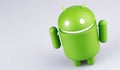 Google Android figure on grey background. Royalty Free Stock Photo