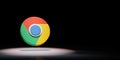 Google Chrome Logo Spotlighted on Black Background Royalty Free Stock Photo