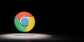 Google Chrome Logo Spotlighted on Black Background