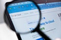 Google Cloud logo on the screen of laptop through magnifying glass Royalty Free Stock Photo