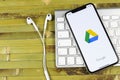 Google Drive application icon on Apple iPhone X screen close-up. Google drive icon. Google Drive application. Social media networ