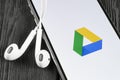 Google Drive application icon on Apple iPhone X screen close-up. Google drive icon. Google Drive application. Social media network Royalty Free Stock Photo