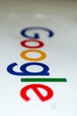 Google logo on a piece of white paper -portrait-