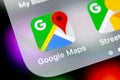 Google Maps application icon on Apple iPhone X screen close-up. Google Maps icon. Google maps application. Social media network Royalty Free Stock Photo