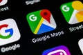 Google Maps application icon on Apple iPhone X screen close-up. Google Maps icon. Google maps application. Social media network Royalty Free Stock Photo