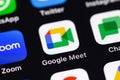 Google Meet icon mobile app on screen smartphone iPhone closeup