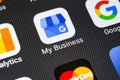 Google My Business application icon on Apple iPhone X screen close-up. Google My Business icon. Google My business application.