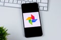 Google Photos app logo on a smartphone screen