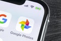 Google Photos plus application icon on Apple iPhone X screen close-up. Google plus Photos icon. Google photos application. Social