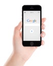 Google search application on the black Apple iPhone 5s display