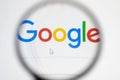 Google search page and magnifying glass