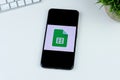 Google Sheets app logo on a smartphone screen. Royalty Free Stock Photo