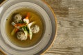 Goose soup, consommÃÂ© with dumplings and vegetables