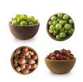 Gooseberries fruits isolated on white background. Gooseberries in a bowl with copy space for text. Red and green gooseberries clos Royalty Free Stock Photo