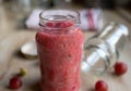 Gooseberry compote in a glass jar Royalty Free Stock Photo