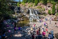 Gooseberry Falls, a popular waterfall near Lake Superior, attracts a crowd of visitors on a