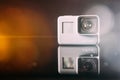 GoPro HERO 5 digital action camera with lens flare Royalty Free Stock Photo