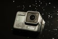 GoPro HERO 5 digital action camera with water drops Royalty Free Stock Photo