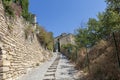 Gordes beautiful old village with pastel buildings on the hill surrounded by mountains in Vaucluse, Provence, France Royalty Free Stock Photo