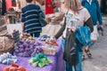 Gordes, Provence-Alpes-Cote d`Azur, France, September 25, 2018: Tourist blonde woman chooses Provence herbs Royalty Free Stock Photo