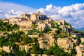 Gordes, a small medieval town in Provence, France. Panoramic view on the top and ledges of the roof of this beautiful Royalty Free Stock Photo