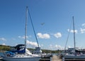 Gore Bay, Ontario, Canada - August 2, 2021: floatplane flying over the Gore Bay Marina during tourist season in the summer