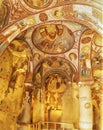 Goreme, Cappadocia, Turkey - 15.12.2021: Frescos and murals in ancient cave church painted in directly onto rock Royalty Free Stock Photo