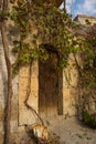 Goreme, Cappadocia, Turkey: Old wooden door. Famous cave hotels in Goreme