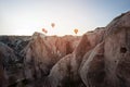 Goreme, Cappadocia, Turkey . Top view of colorful hot air balloons flying over the Love valley on sunrise Royalty Free Stock Photo