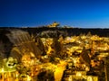 Goreme, Cappadocia, Turkey. View of the evening city from the mountain. Bright evening city and clear sky. Landscape in the summer Royalty Free Stock Photo