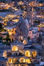 Goreme, Cappadocia, Turkey. View of the evening city from the mountain. Bright evening city. Landscape in the summertime. Royalty Free Stock Photo